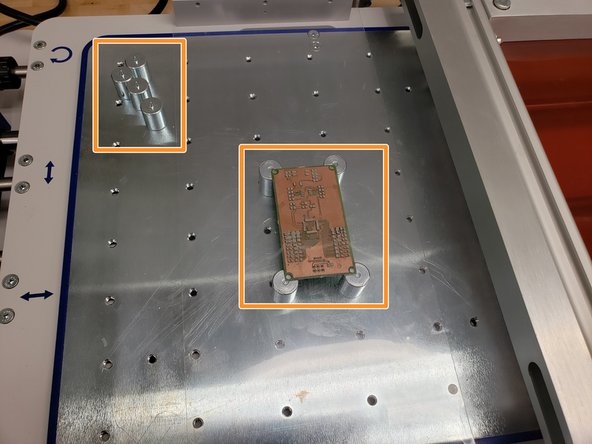 Align the magnetic holders to the four corners of the board.