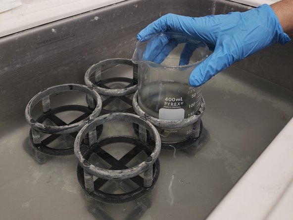 Place the beaker(s) in the holsters in the sonicator bath.