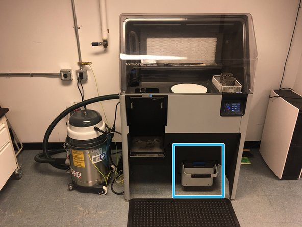 Locate the Powder Bin drawer at the bottom right of the Sift