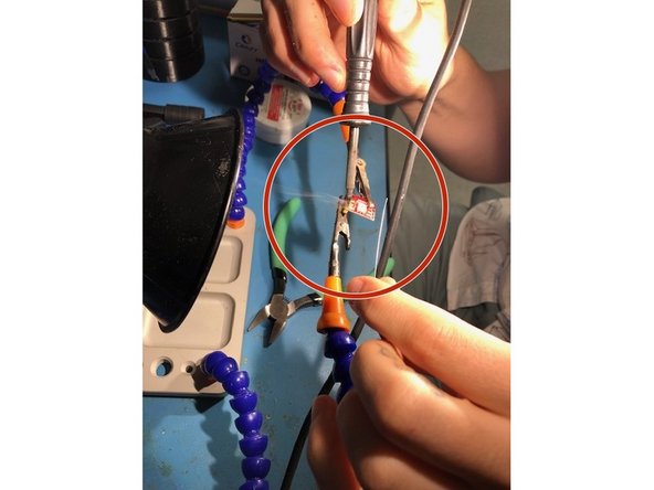 Begin by placing the soldering iron onto the pin AND the socket.