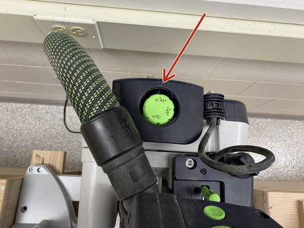 The miter saw is locked into place at a 0 degree angle when not beveled.