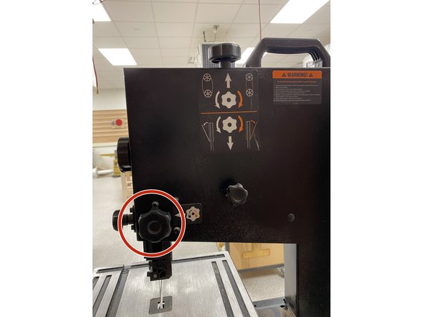 Before every use of the band saw, the blade guard has to be readjusted to the correct height above the workpiece