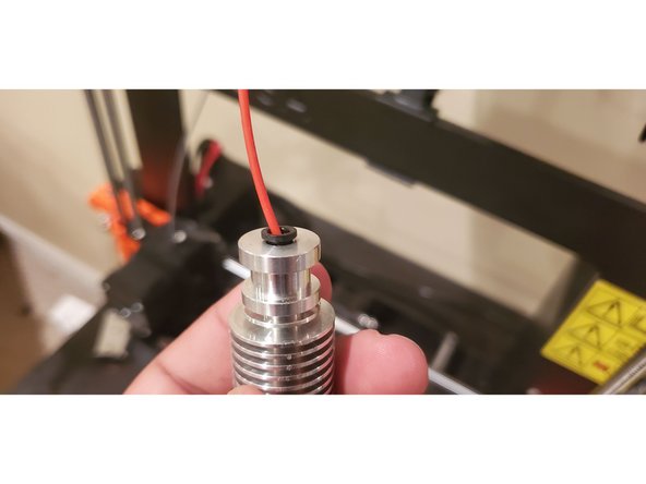 Heat Creep is when the filament inside the hotend begins to liquify and clog the extruder assembly. A good way to figure out if heat creep is the problem  is if you try to unload the filament and you see the stepper turning but the filament doesn't move