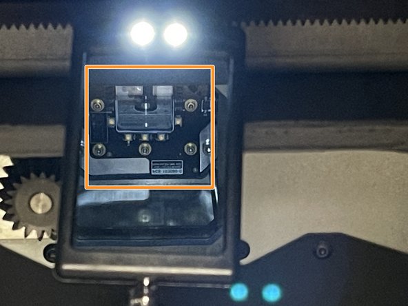 Loosen the screw to drop the optical cassette tray and remove the optical cassette. *reference Fuse printing Dozuki.
