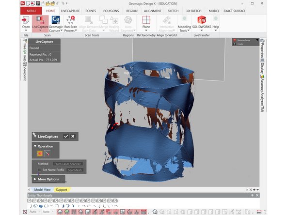 Placed the pens' case into the scanning table