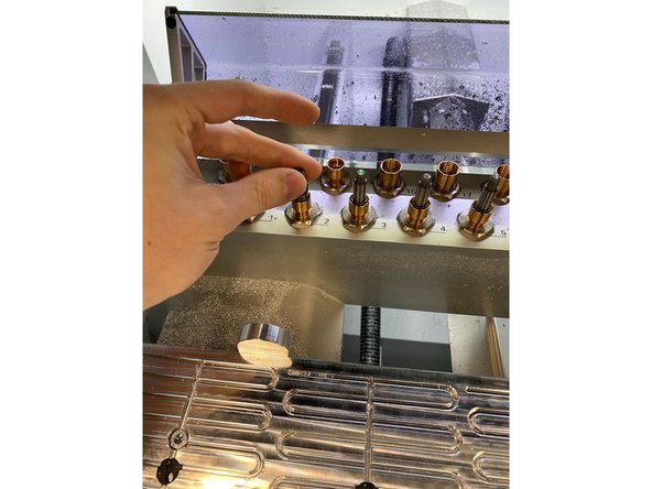 Now insert the tool into the magazine, pushing it down firmly, then selecting okay on the screen saying the tool has been changed.