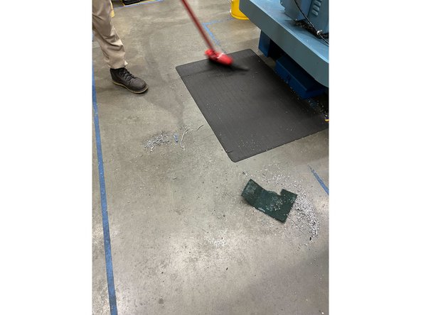 Use a broom and dustpan to clean the floor and general area