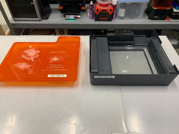 Take the cover off of the resin tank box