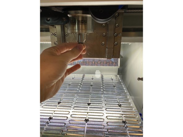 Click okay once you have a hand on the spindle and collet itself.