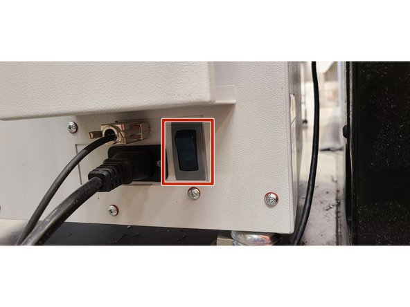 Switch the vacuum cleaner off before opening the machine. The power switch is highlighted in the red box.