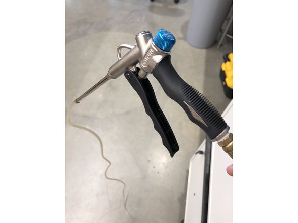 Turn hose to &quot;Power Wash&quot;, and spray down the tube.