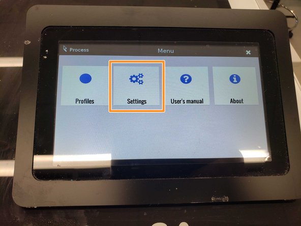 Turn the machine on and tap the hamburger menu icon