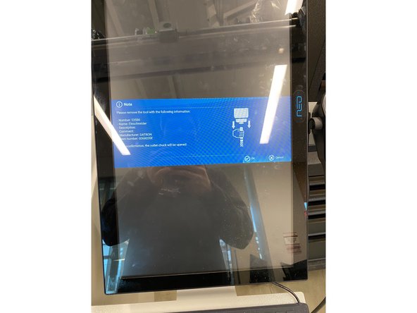 Click okay once you have a hand on the spindle and collet itself.