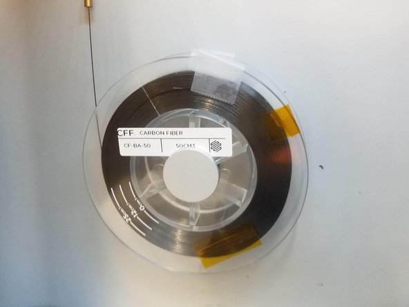 Place the fiber on the spindle and attach the magnetic cap