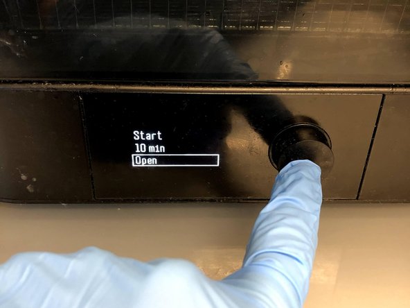 Press the black button to turn on the wash