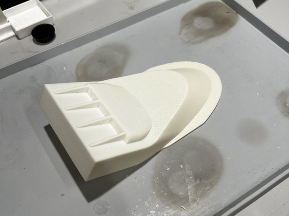 After all of the support structure is removed, inspect the model for any leftover bits of support.