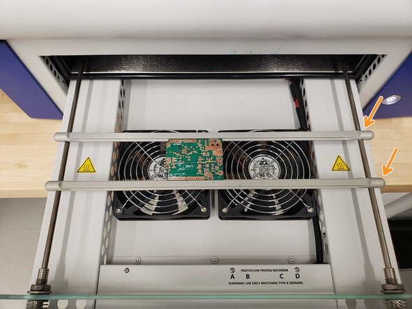 Once the process is complete, the machine will beep and open the drawer for you to take the board out.