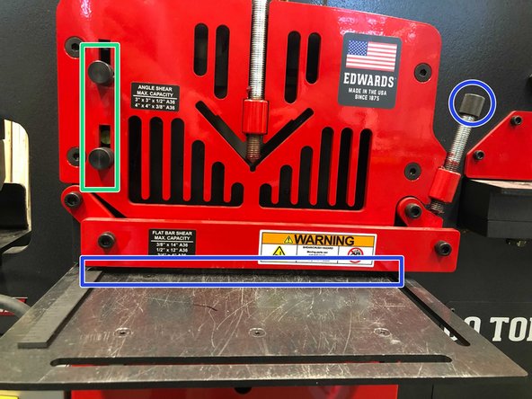 Align your part with the jaws seen through the slits. Your part will be cut along that line.