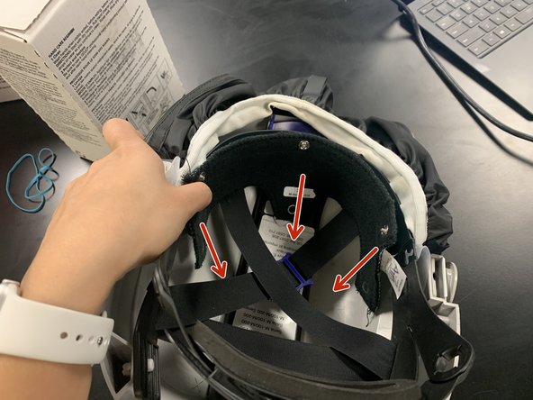 Place the cloth headpiece with the blue side touching the top of the head cover.