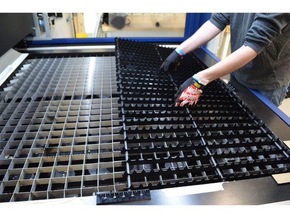 Add the metal grate. You may need both grates for a large job