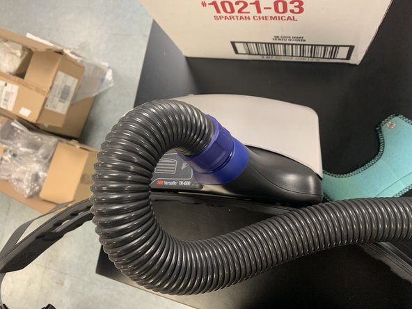 Push down and twist clockwise to lock it into place.