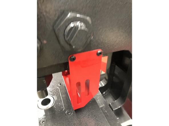 Use the 9/64th T handle to remove the screws and then tighten the guard back into place.