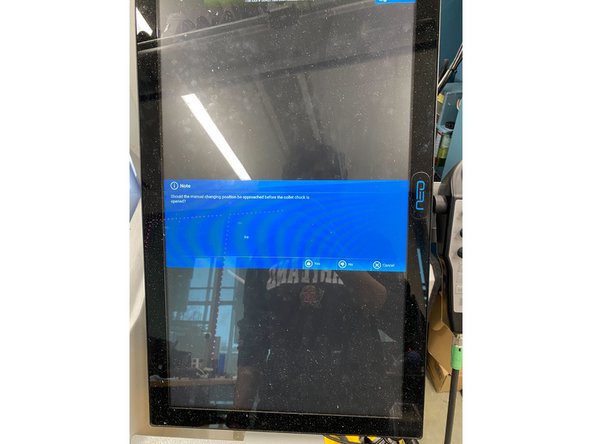 Once selecting the option to open the collet chuck you will be greeted with a prompt asking if you want to move to the manual changing position.