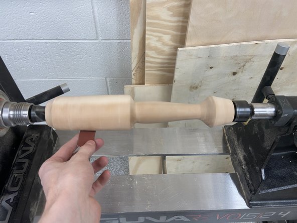 Use wood turners sanding rolls as these do not rip as easily as regular sandpaper.