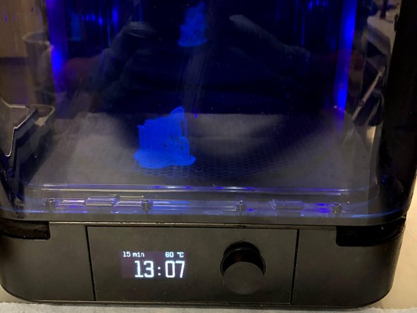 Open the lid and place completely dried parts on the circular plate