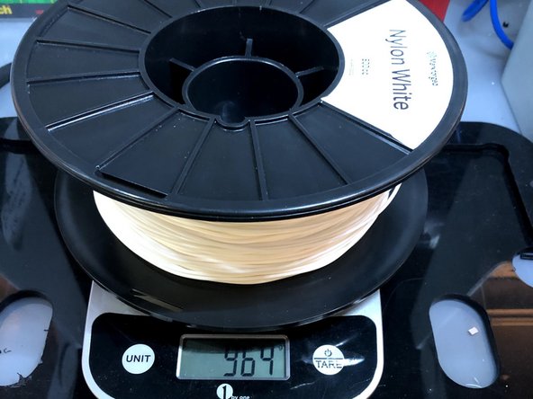 Pull the magnetic spindle cap and spindle body apart