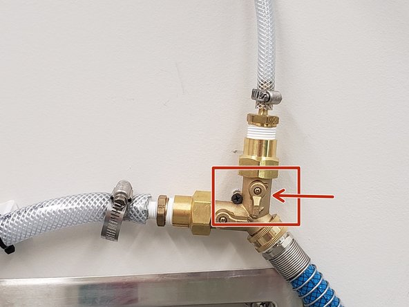 DO NOT Touch the second switch perpendicular to the tube. It controls the water pressure to a different printer and messing with it could cause issues with it.