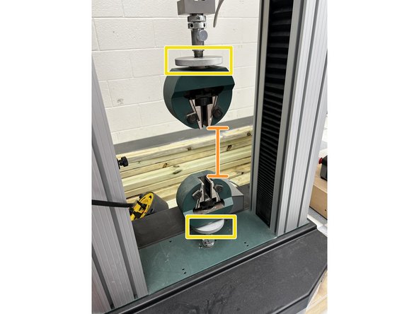 Move the jaws to a position with enough space between both jaws for your hook and base to fit.