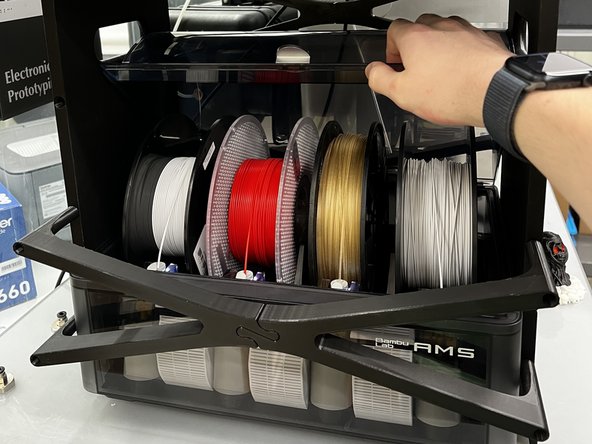 Both AMS modules can be opened to insert/remove filament spools.