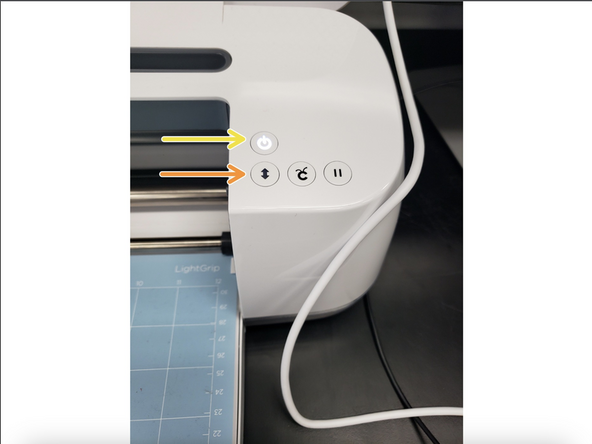 Press the flashing load/unload button on the machine