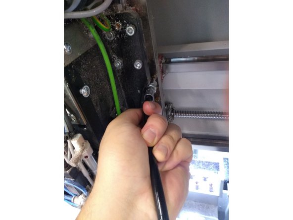 Take out the greaser from the husky drawer that is labeled as greaser. push the greaser into the holes shown and squeeze the handle.