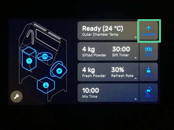 Press the &quot;Unpack&quot; button on the Sift touchpad to lift the powder cake out of the build chamber