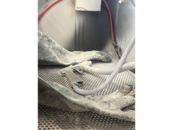 Step 3: Take a second to look in and observe the now-lit internal cavern. You should see the main static nozzle fixed near the center top (Picture 2). You should also see the inner air sand gun (Picture 3).