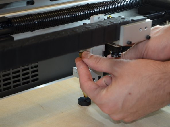 Make sure to not touch the focusing lens.