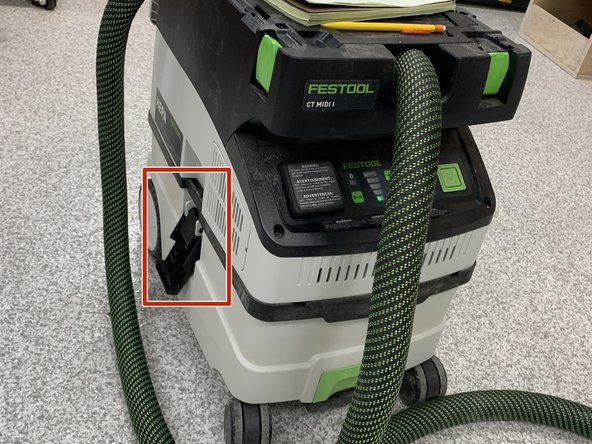 Unplug the vacuums before emptying them.