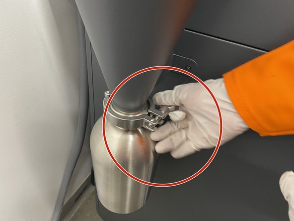 Remove the fines jar on the vacuum cyclone