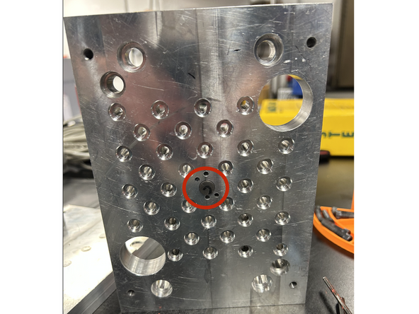 Insert the Center (Shorter) pin into the pin plate.