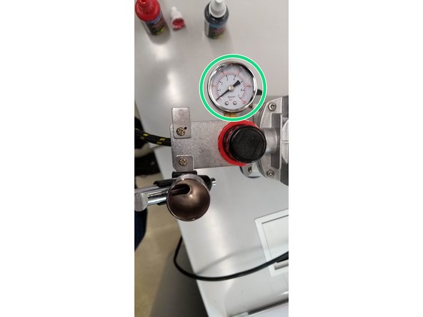 When you are finished painting, turn the air compressor off. Press and hold the control button down and allow the brush pressure to return to 0 on the gauge.