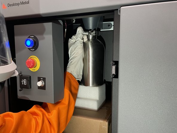 Slide the drawer out to see inside the overflow keg and verify that it is empty