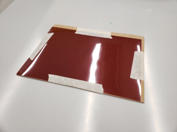 Tape the polyimide foil to a piece of cardboard.