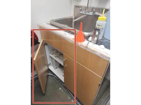 If there aren't any beakers out, they can be found in the cabinet under the sink