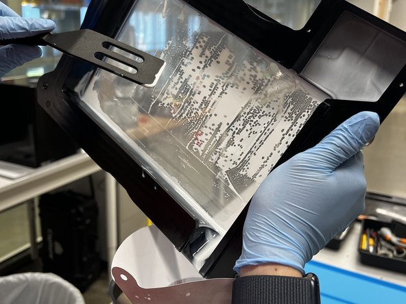 Only use a rubber spatula! metal or plastic ones will destroy the clear plastic membrane!