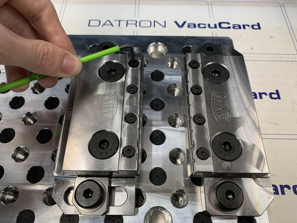 Loosen jaw clamping bolts and replace with desired jaw.