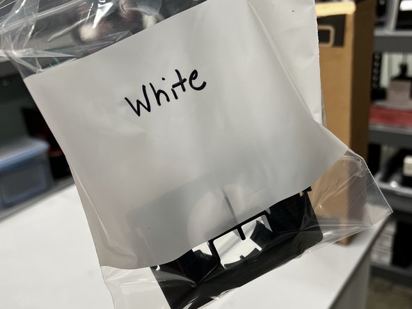 Place the spout that was set aside in a bag labeled with the type of resin it was used for. For example, we were replacing white with clear, so the bag is labeled &quot;White.&quot;
