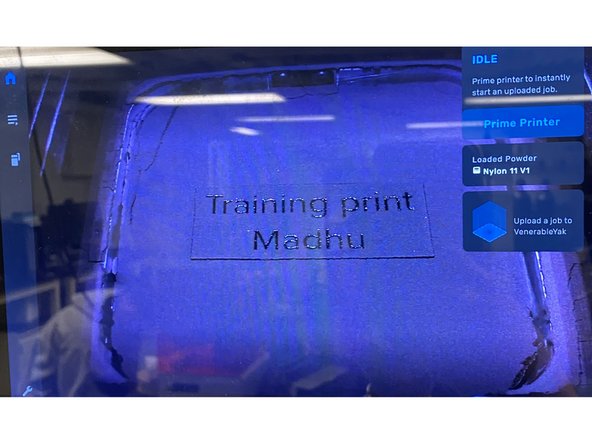 Once the print is done, the Fuse will look like this with the name of each part on top of the print bed