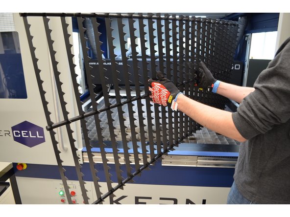 Add the metal grate. You may need both grates for a large job